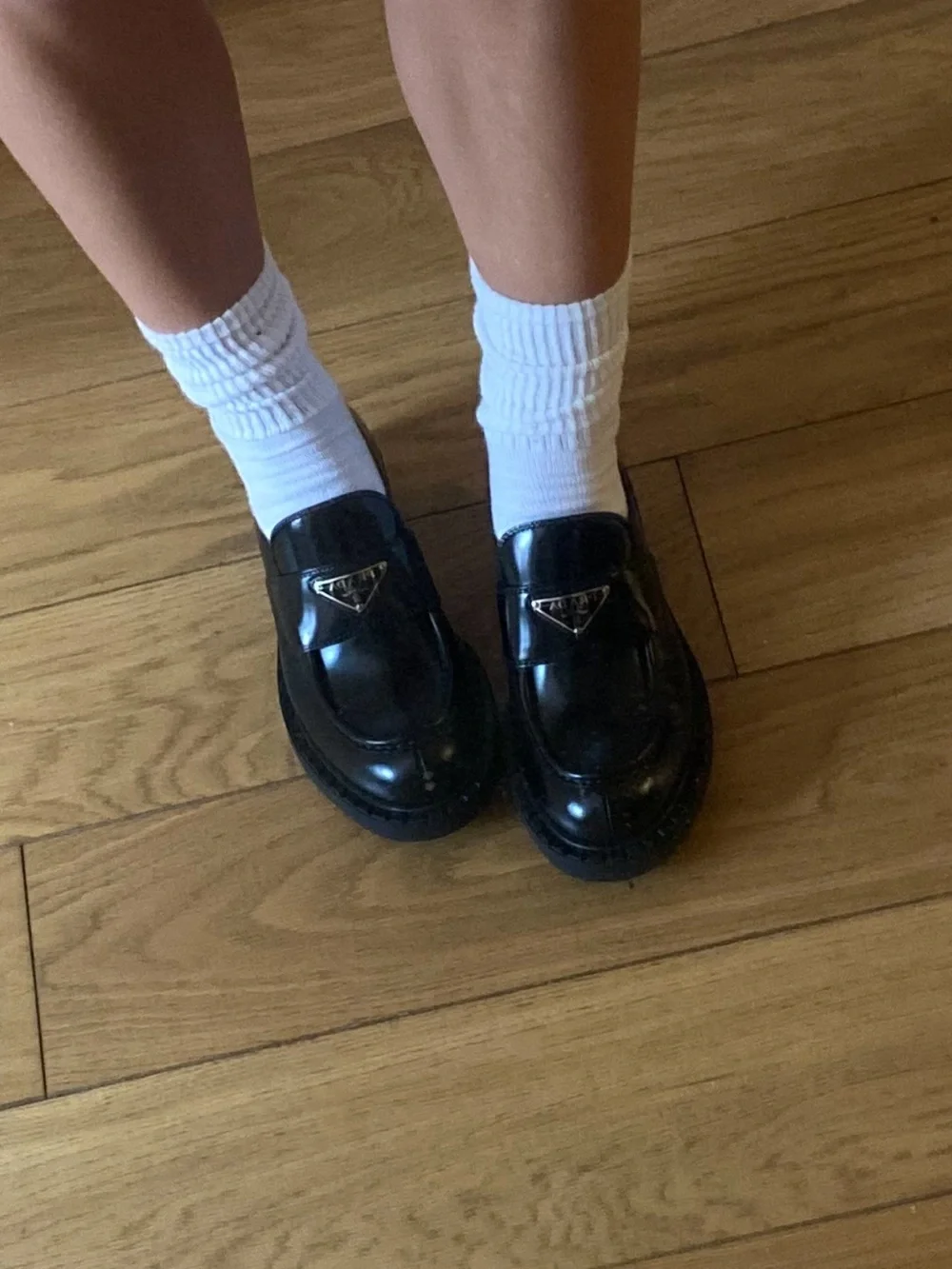 Prada logo leather loafers